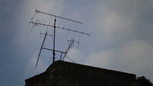An old TV antenna on the roof.