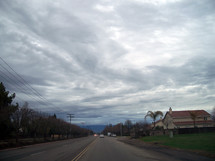 The Coming storm clouds roll in around a small California town somewhere near Visalia California looking like something from a movie. 