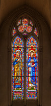 sunlight shine through church windows colorful stained glass Montpellier