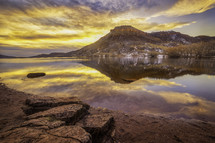 Colorful Clouds reflect in the lake at Flatiron Reservoir in Larimer County Colorado