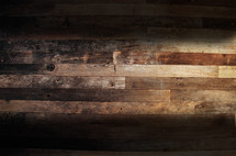 wooden boards form the floor in an ancient warehouse