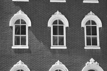 windows on a brick building 