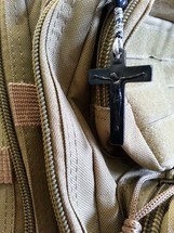 cross on a backpack 