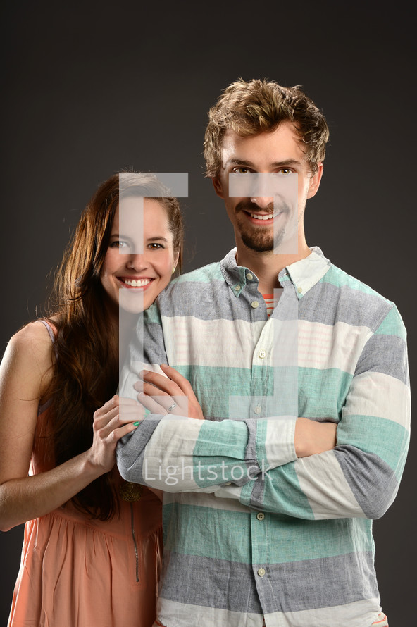 young couple posing for a portrait 