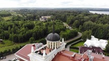 aerial view over a building with a dome 
