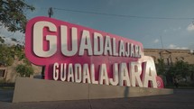 Letras letters of Guadalajara Jalisco Mexico with Cathedral of the Assumption of Our Lady on Background