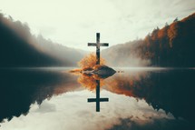 Cross on a background of mountains and lake