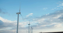 Large wind turbine farm generating electricity