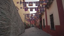 Colorful Papel Picados Decorated The Street Alley during Day of The Dead Dia de Los Muertos Festival Guanajuato, Mexico