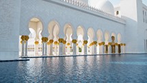 Water Under The Columns Of Grand Mosque In Abu Dhabi 