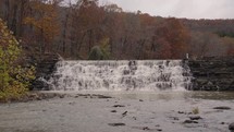 Devil's Den State Park Cascade Waterfalls and River Lake during Autumn Fall Foliage Arkansas USA