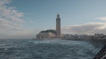 Mosquée Hassan II Mosque and The Ocean Sea Beach Waves in Slow Motion from Maritime Promenade Casablanca, Morocco