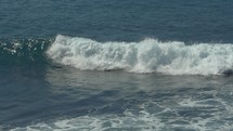 An ocean wave breaking 