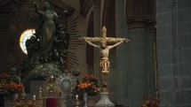 Statue of a crucifix and the eucharist in a Catholic cathedral in Mexico.