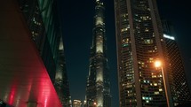 City skyscrapers illuminated at night