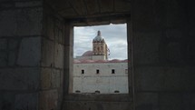 Tower of Templo de Santo Domingo de Guzman Church and Convent in Oaxaca Mexico seen from Window