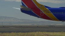 A Southwest airlines jet taxiing to the runway