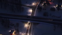 Aerial view of traffic on an overpass during a winter night