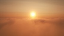 Sun rises above the clouds