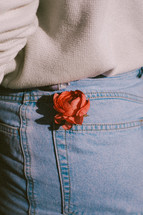 a rose in a back pocket 