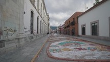 Oaxaca, Mexico - November 1, 2023: Day of The Dead Dia de Los Muertos Calavera Sugar Skull Sand Painting and Sculpture
