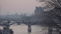 Musée du Louvre Museum and Pont des Arts Picturesque Bridge Paris, France