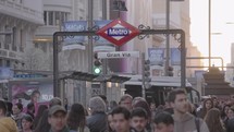 Slow Motion Crowd of People Walking on Calle Gran Vía Street during Sunset Madrid, Spain