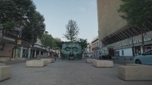 Large sculpture of a head with a tree growing out of it in downtown Centro Guadalajara, Jalisco, Mexico