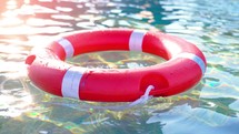 Safety equipment, Life buoy or rescue buoy floating. 