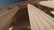 Paris, France - The majestic neoclassical facade of La Madeleine Church in Paris, with its grand Corinthian columns.