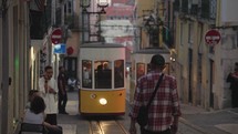 Lisbon, Portugal - The iconic yellow elevador da Bica Funicular in a narrow beautiful alley in the morning Lisbon, Portugal