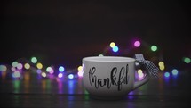 Thankful mug and string of lights 
