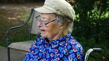 Close up of an elderly woman talking and smiling