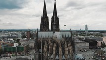 Approaching the historical, gothic, Cologne Cathedral building of Cologne, Germany.