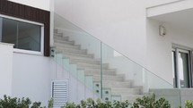 modern house staircase with glass railing