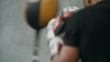 boxer hitting a punching bag 
