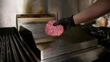 The Professional Cooking Of A Raw Hamburger