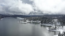 Aerial view over Bass Lake in winter 