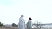 Jesus walking with Mary