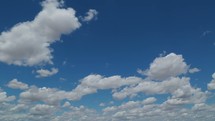 moving clouds in a blue sky