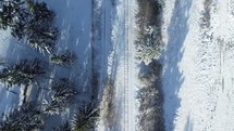 aerial view over snow on tracks 