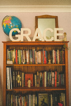 word Grace on a book shelve