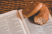 bread on the pages on a Bible 