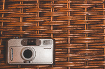 old camera in a basket 