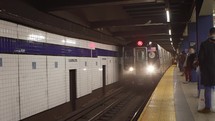 approaching train at a subway station 