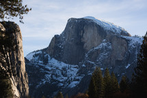 Mountain with trees and snow in Yosemite