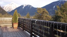 Terrace with beautiful mountains covered with snow view. Alpine view, snow on hills.