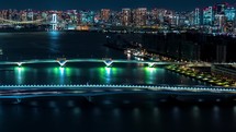 Time-lapse of the Rainbow bridge across Tokyo Bay at night