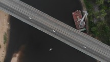 Bridge with traffic over the river aerial drone footage