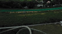 Green synthetic ski slope in the mountain 